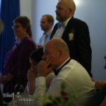 Ida holder tale/viser diasshow med billeder og indspillet sang